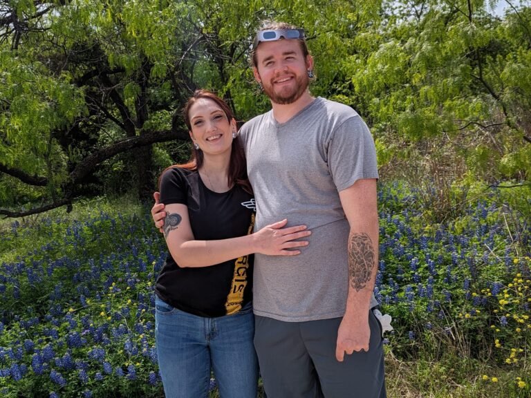 I'm a stay-at-home dad who took my wife's last name. She manages our finances while I run our household.