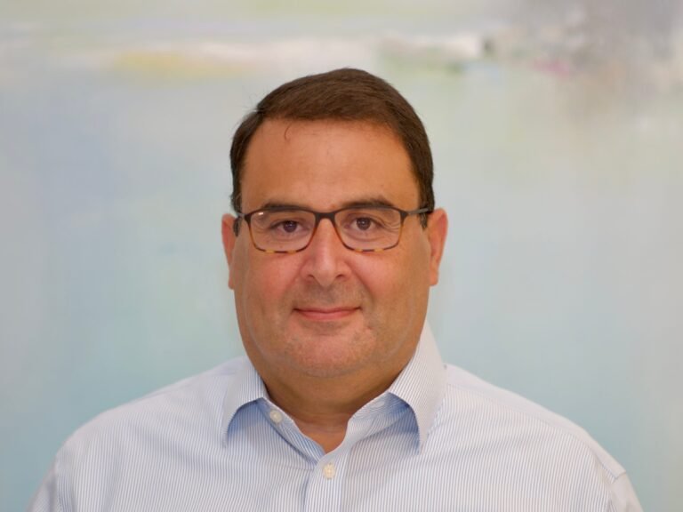 The CEO of a packaging automation company says there's no replacing human workers