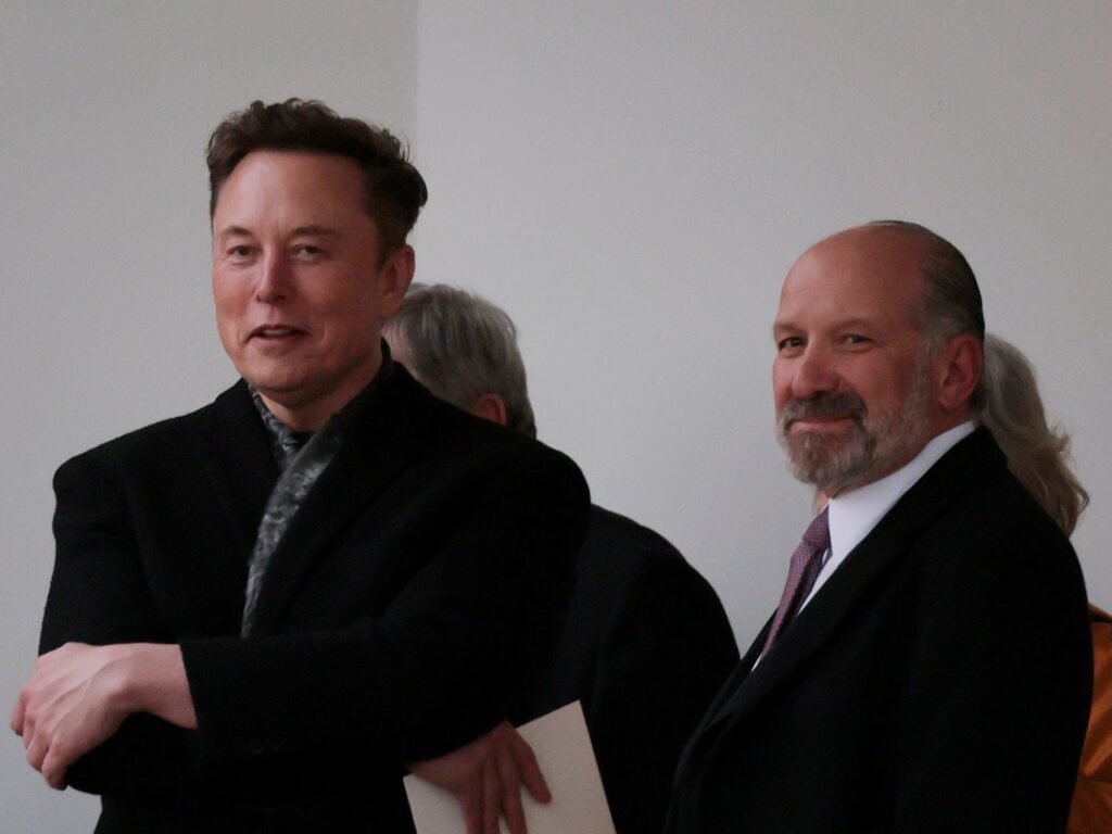 Howard Lutnick says Elon Musk vowed onstage that DOGE would cut $2 trillion in spending when he was supposed to say $1 trillion