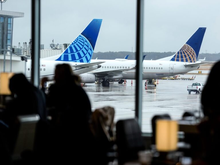 A United Airlines passenger says a pilot forced him from an airplane bathroom for taking too long. Now he's suing.