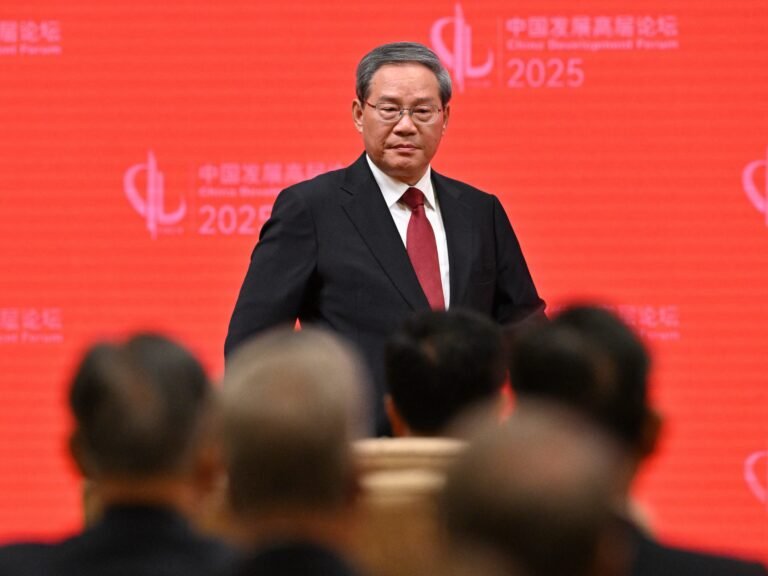 China just told execs from Apple, Citadel, and Qualcomm that Beijing is still down to do business even with 'unexpected shocks' to trade