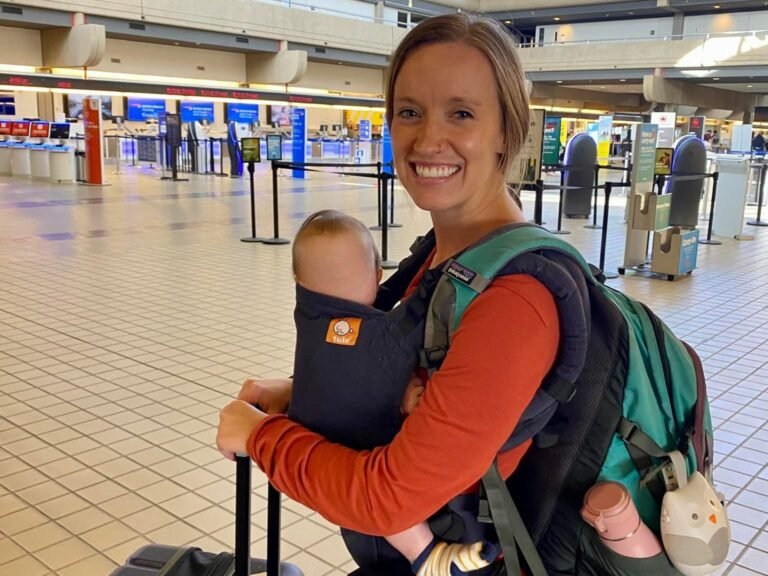 My baby screamed during a flight, and I broke all my parenting rules trying to soothe her. A stranger still told me I was a good mom.