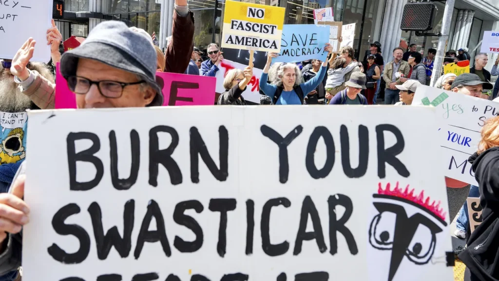 Protests target Tesla showrooms worldwide over Musk’s role with DOGE