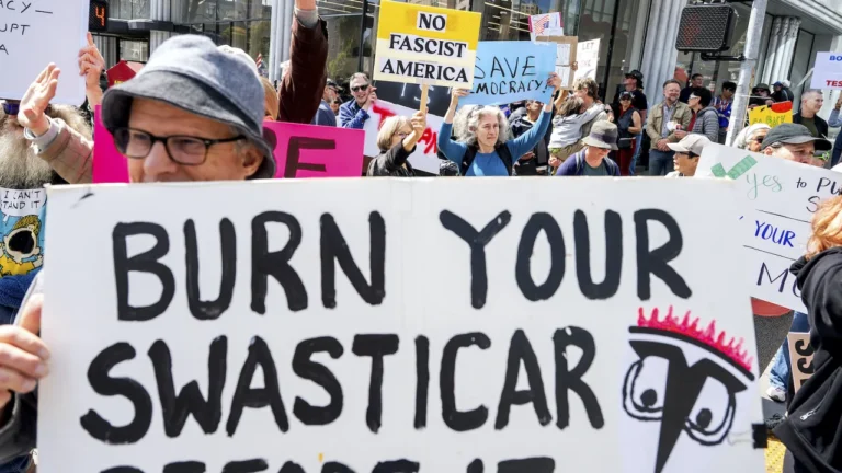 Protests target Tesla showrooms worldwide over Musk’s role with DOGE