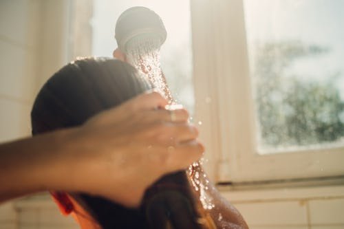 Does Rinsing Your Hair With Cold Water Actually Do Anything?