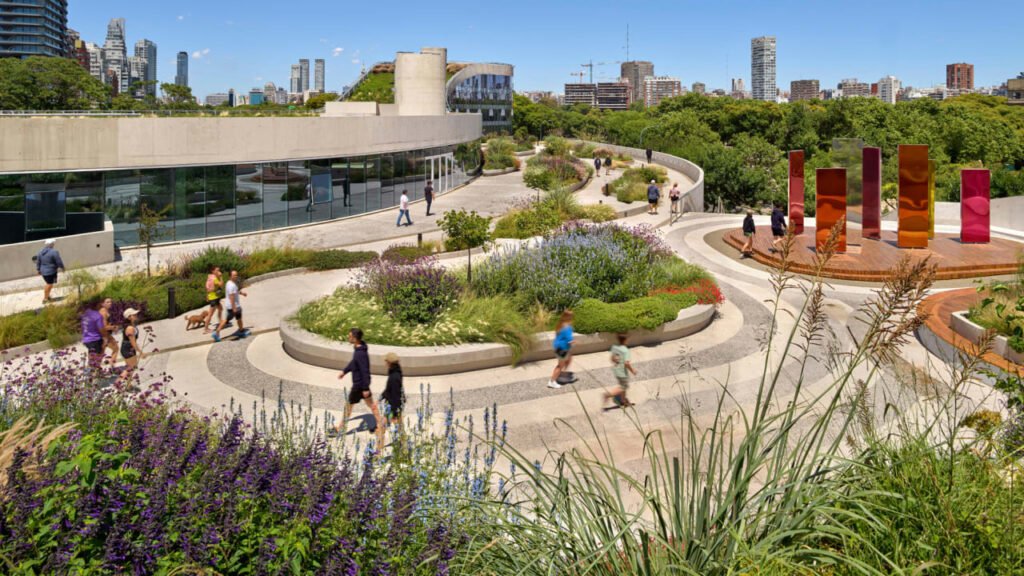 A once-abandoned parking garage in Buenos Aires is now a stunning tower with a park on top