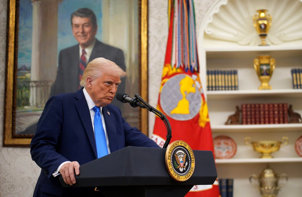 Trump, defiant on tariffs, claims trade deals are in the works