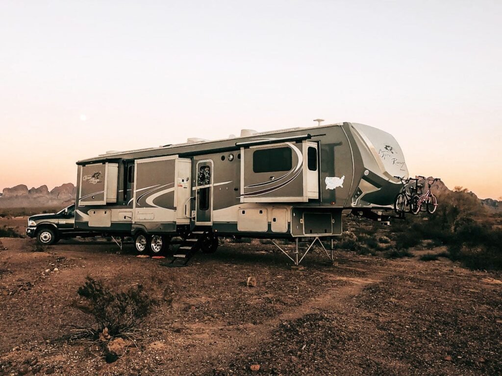 My family turned a 400-square-foot trailer with rotting floors into a mobile home with 2 bedrooms and a rock wall. See inside.