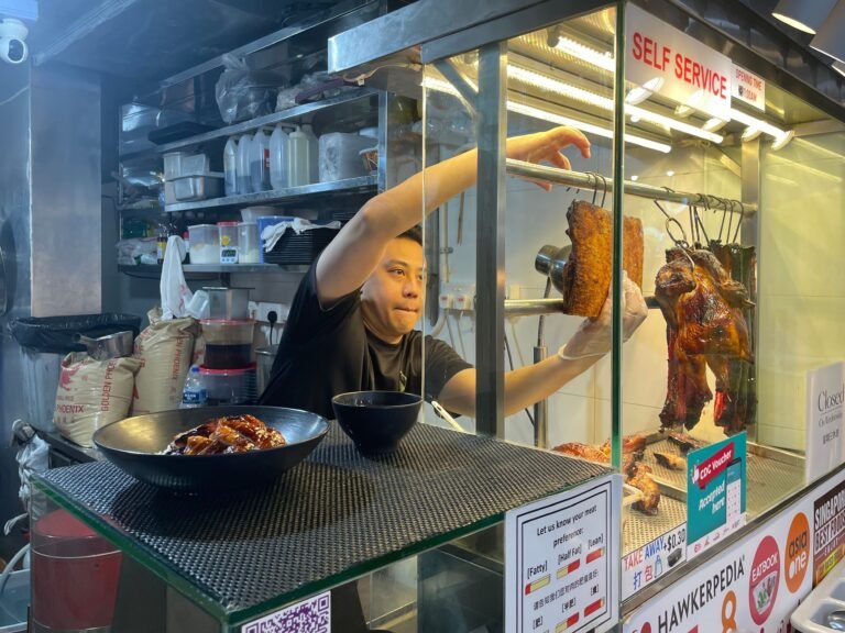 He won a $1 million lottery, then quit his cushy insurance job to open a Cantonese barbequed pork stall. Trading a corporate office for a hot kitchen was harder than he thought.