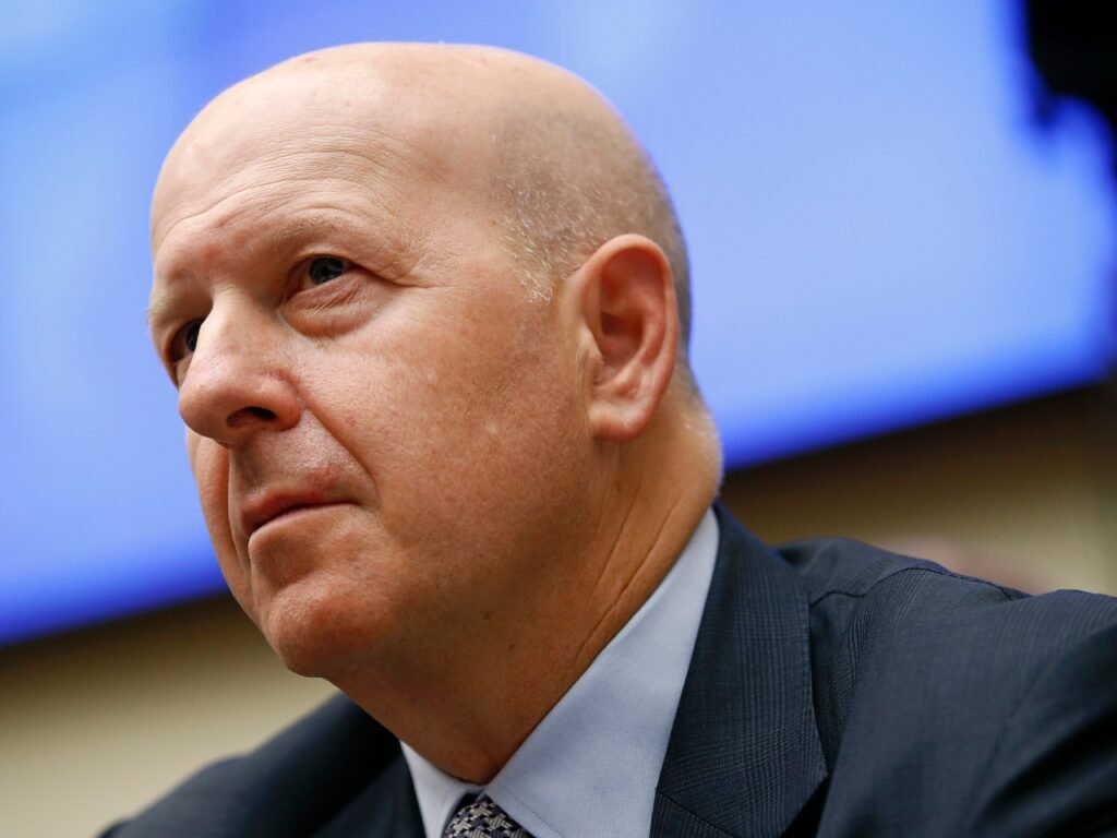 Market turmoil lifts Goldman's trading, hurts dealmaking business