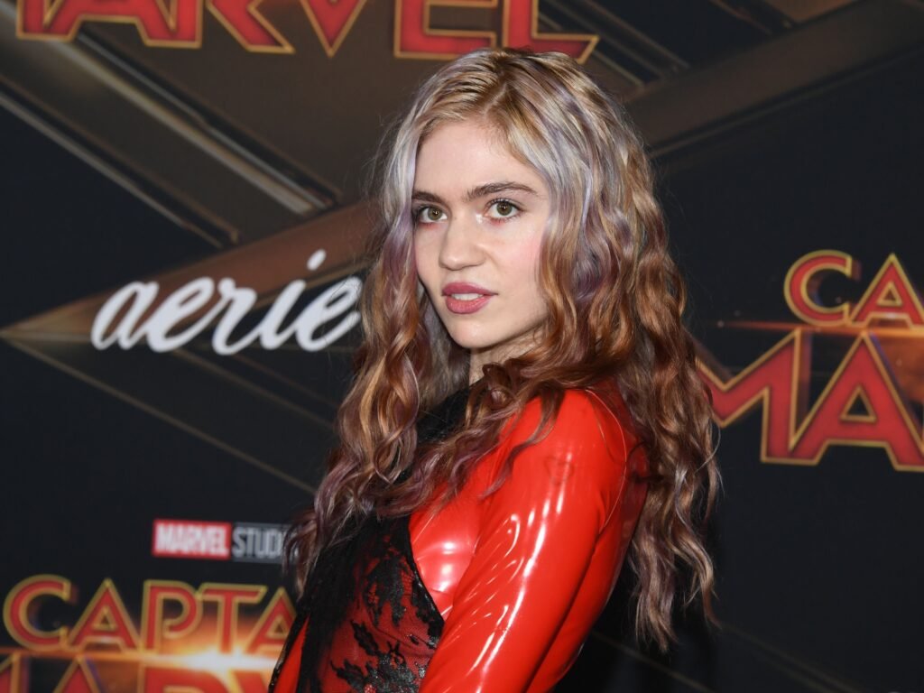 Grimes says she feels 'enraged' that she won't be able to protect her daughter from ads and beauty standards
