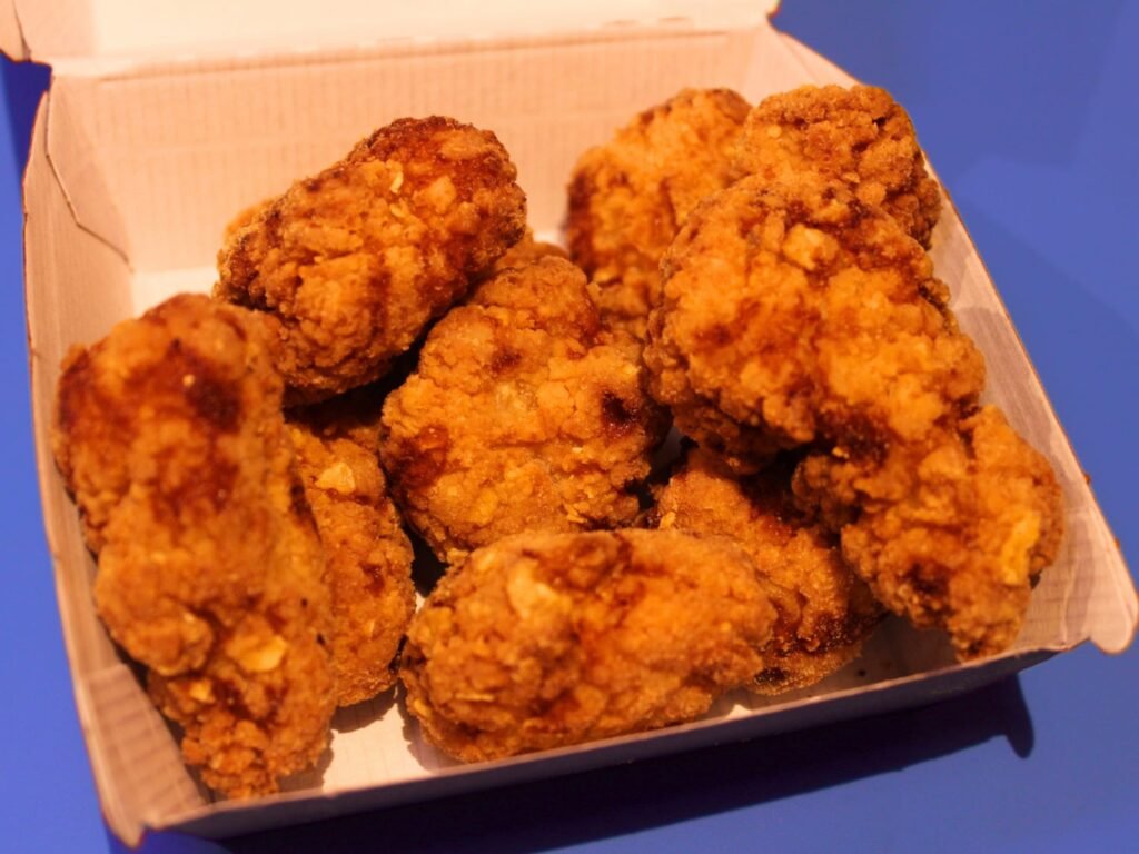 Taco Bell's nuggets return this month and will become permanent by 2026, with more crispy chicken items on the way