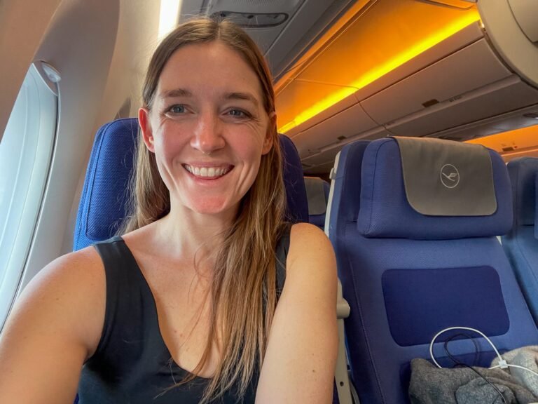 I sat in the front and back of economy for a round-trip long-haul flight. I'm still partial to the back.