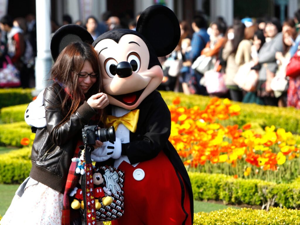 Conservatives say Disney's become too 'woke.' The company's most passionate fans aren't buying it.