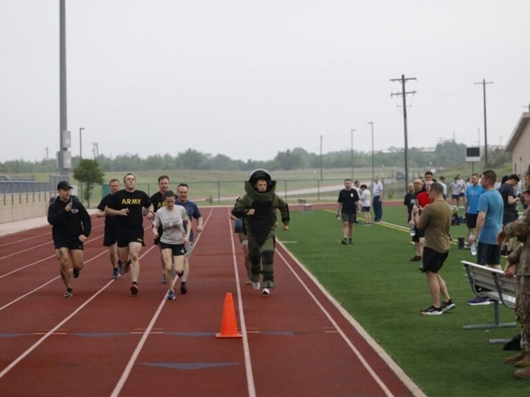 A US Army officer who handles explosives broke the world record for the mile run in a bomb suit. He was 20 seconds faster.