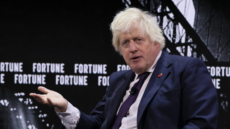 A Texan Ostrich Biting Boris Johnson At A Drive-Thru Safari Park Is Justice For His Awful Car Writing