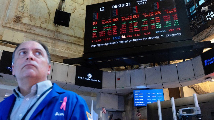 Stock plunge on Trump's tariffs despite strong jobs report
