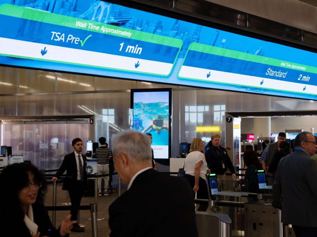 We visited 2 of the busiest US airports on the first day of Real ID requirements. Here's what our reporters saw.
