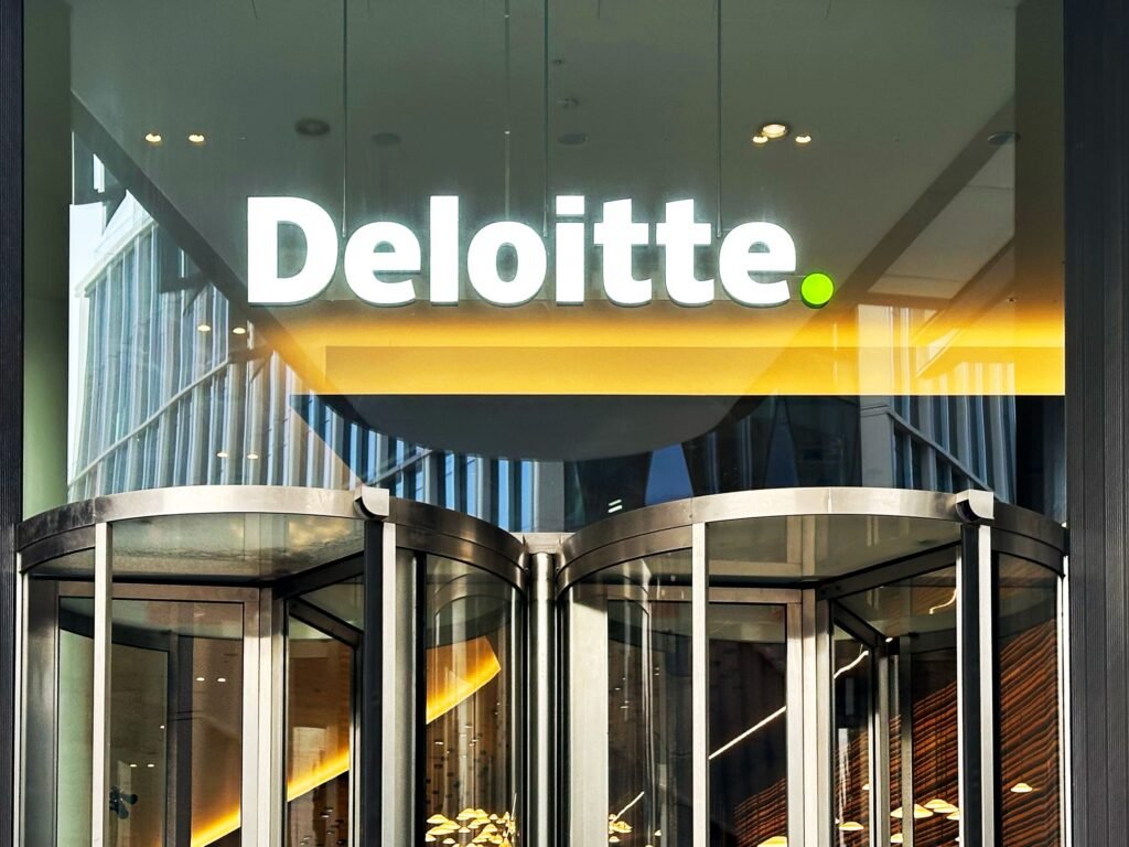 Deloitte UK is cutting some bonuses and promoting fewer staff after falling short of targets