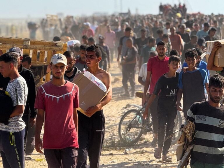 Chaos erupts after thousands of Palestinians rush to grab aid in Gaza