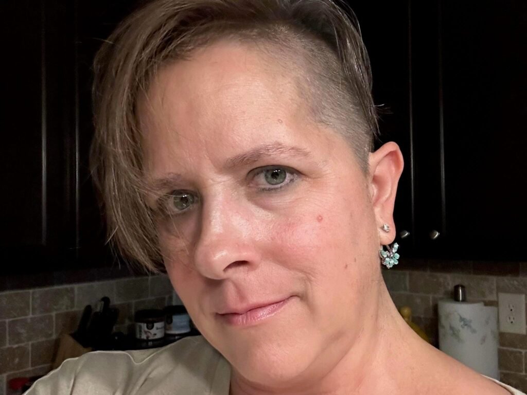 A Gen Xer bumped her pay to $100K by taking on a second office job with her employer — and she works a side hustle to manage the stress