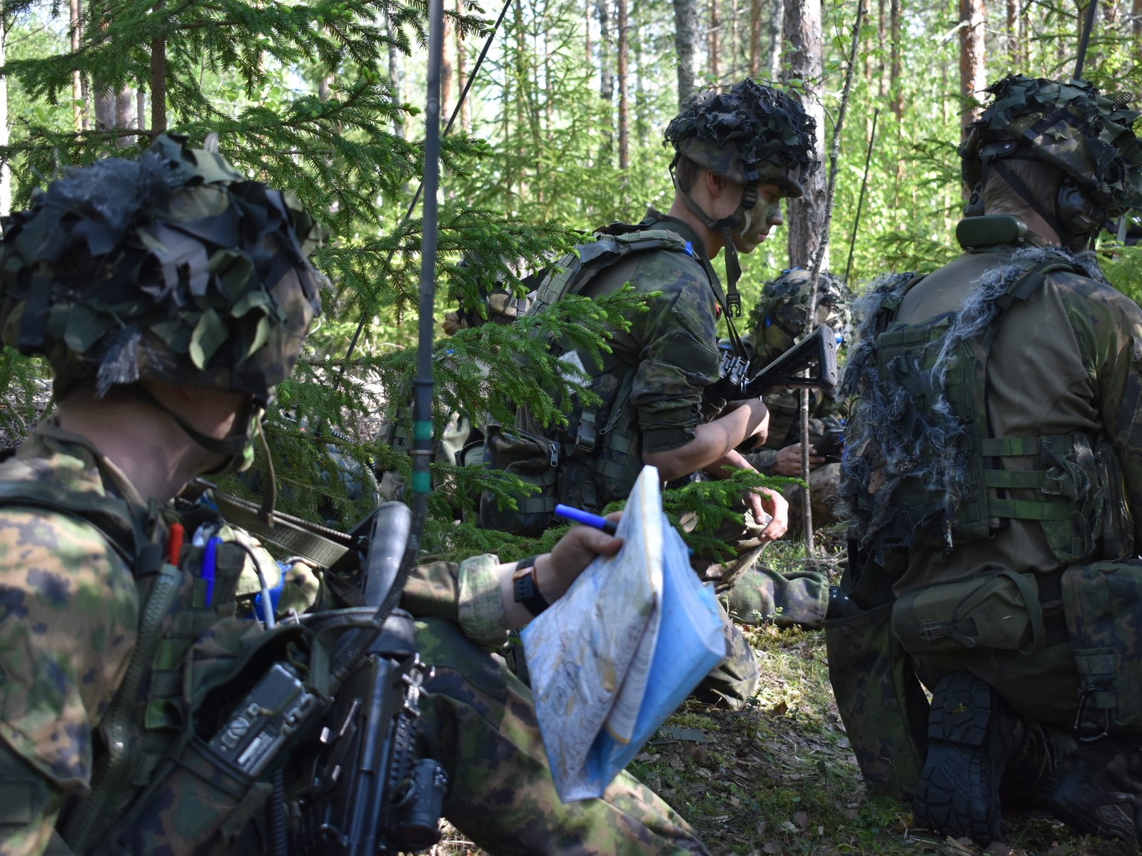 Finnish soldiers are going old school with paper maps so they're ready if an enemy shuts down GPS