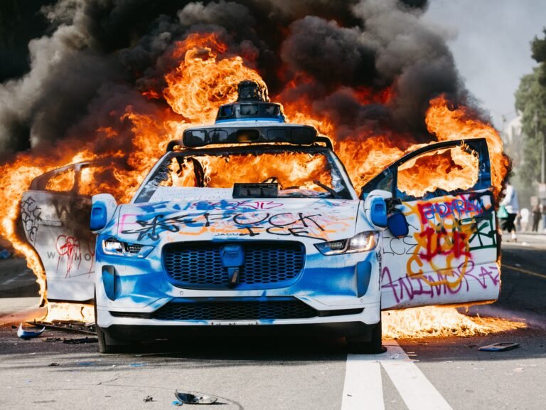 Waymo suspends robotaxi rides near LA protests after 5 cars are set ablaze