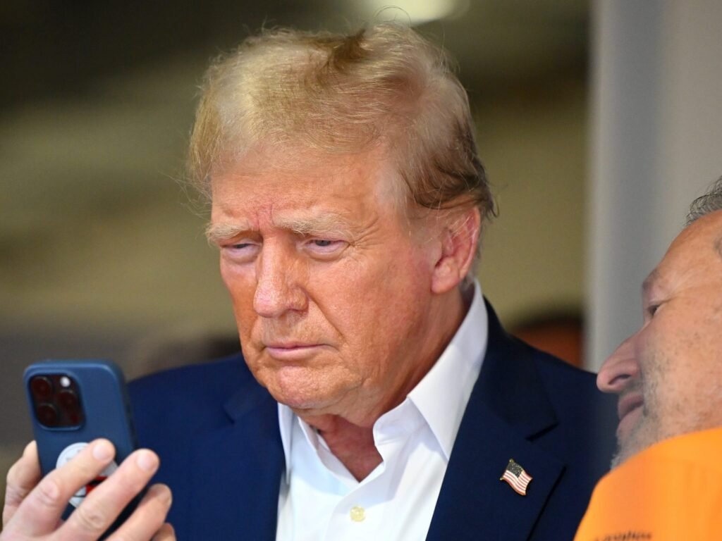 Photos show Trump's been an iPhone guy for a while now