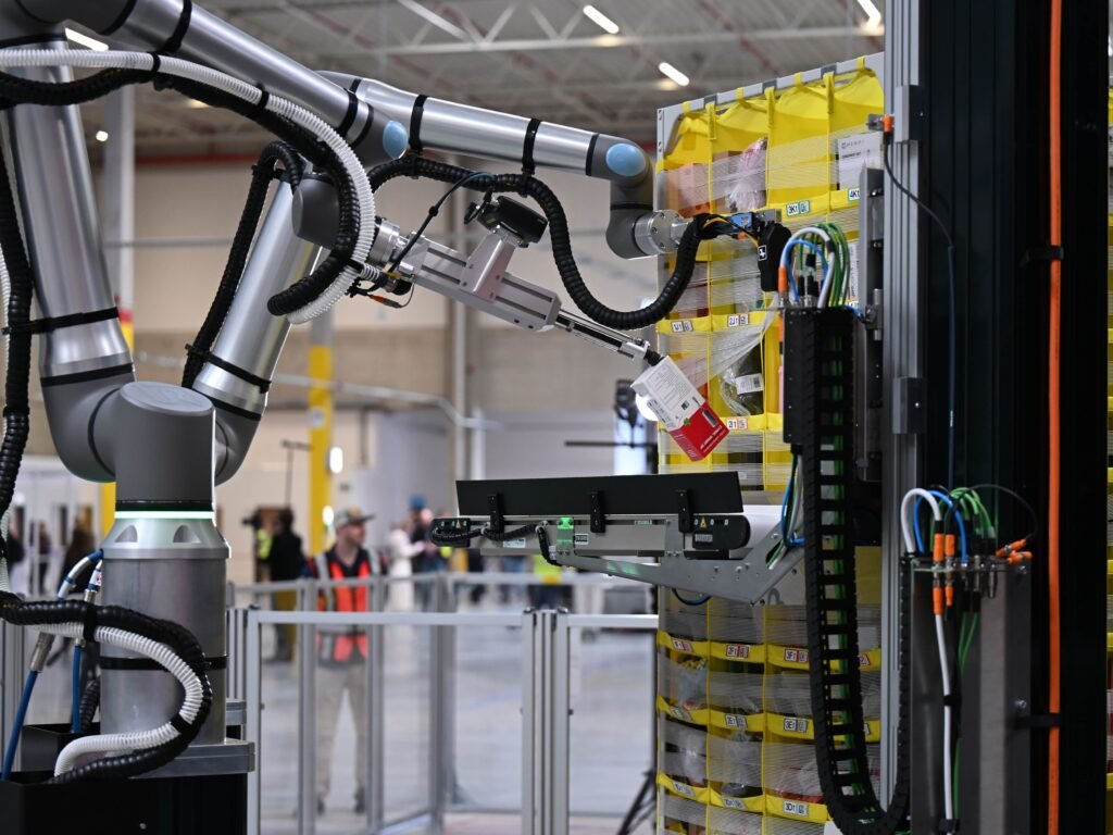 Tariffs won't fix America's manufacturing problem — but AI might, Goldman Sachs says