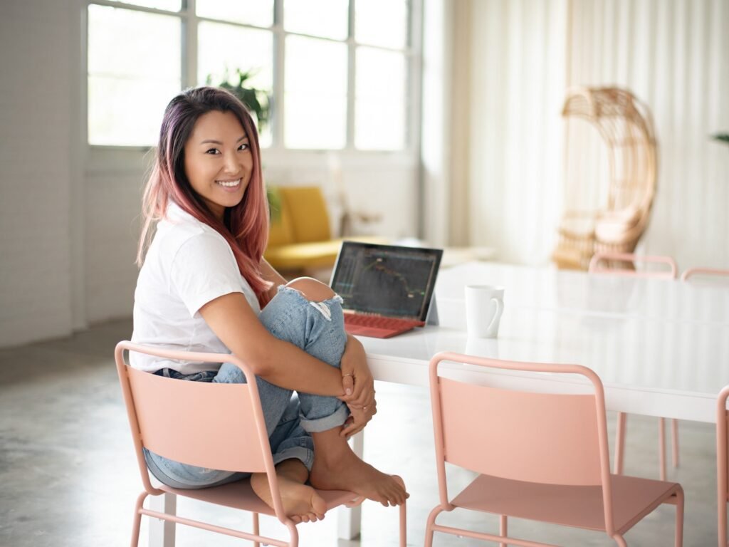A millennial paid off six figures in debt and built a $1 million net worth. She explains how she invests her money.