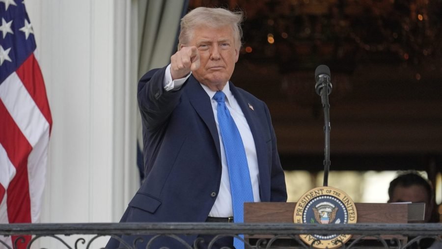 Live updates: Trump meets with Germany's leader after issuing 12-nation travel ban