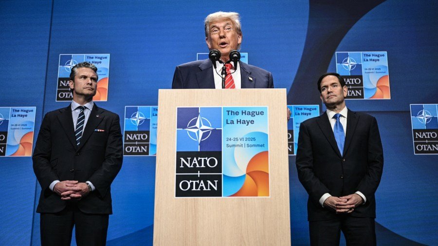 Trump slams intel report, hits Spain at NATO summit
