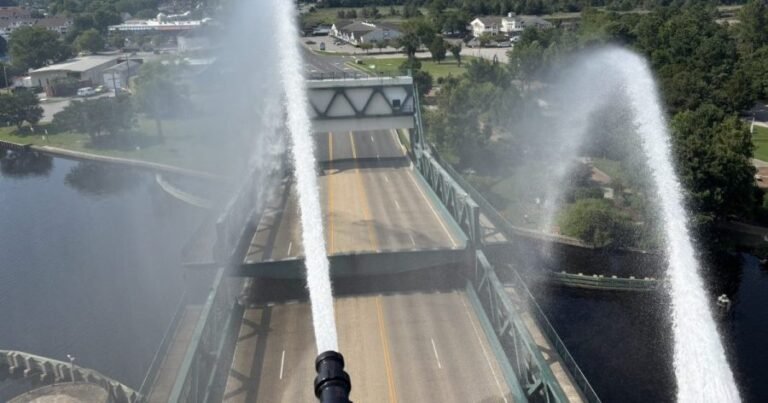 Fire hoses used to cool Virginia drawbridge after it got too hot to close