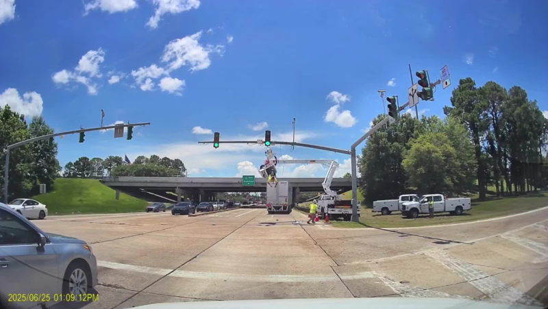 VIDEO: 18-wheeler hits Louisiana state employee working in utility bucket truck