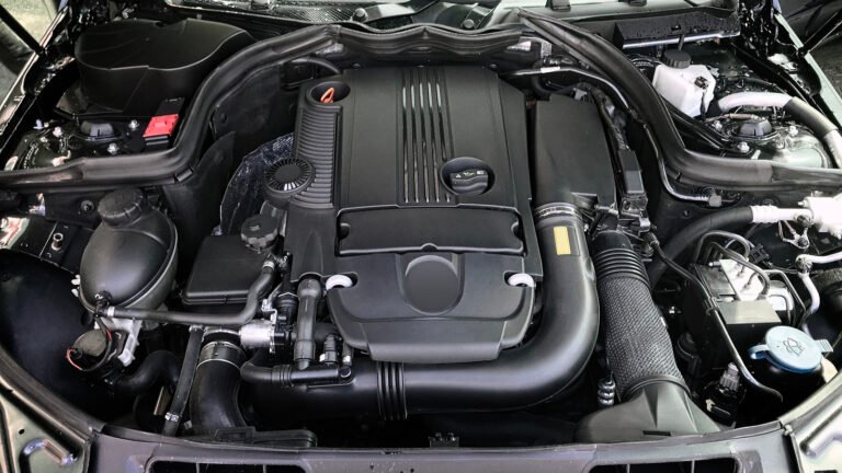 Your Car's Engine Bay Is A Plastic Mess And Here's Why