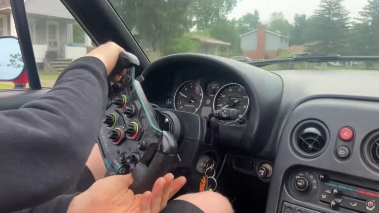 Driving Your Mazda Miata With An F1 Sim Rig Steering Yoke Is Probably A Bad Idea