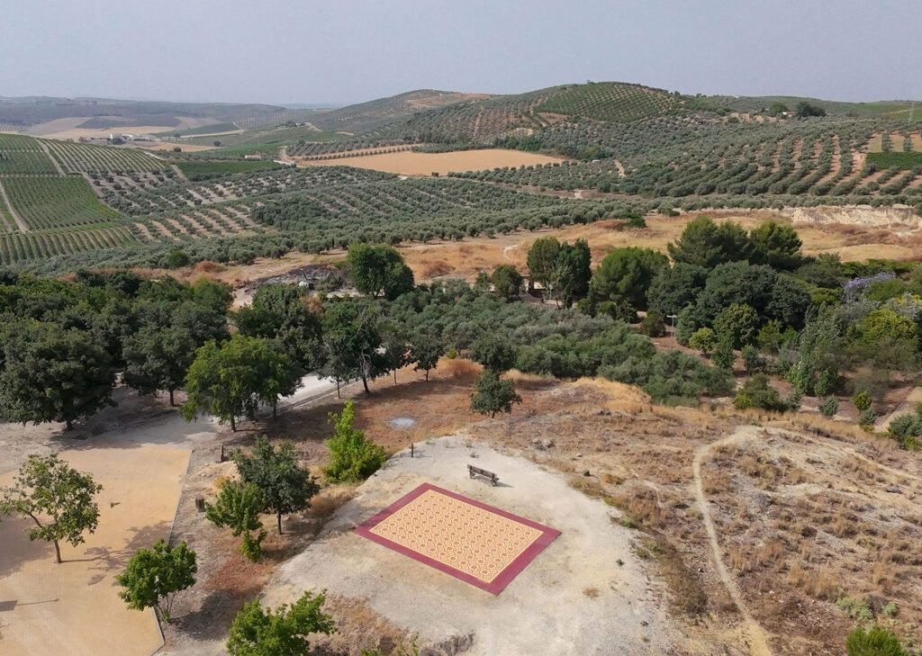 Among Andalusian Vineyards, a Vivid Carpet Creates a Space for Gathering