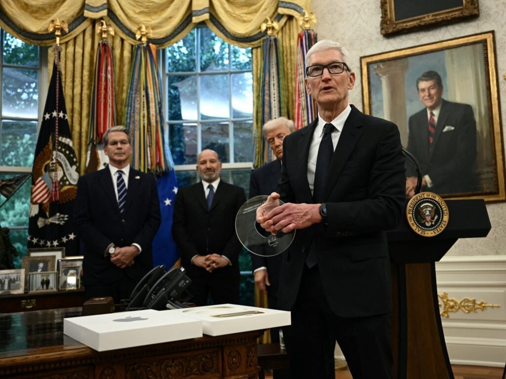 Tim Cook gifts Trump customized Apple glass to celebrate the tech giant's new US investment