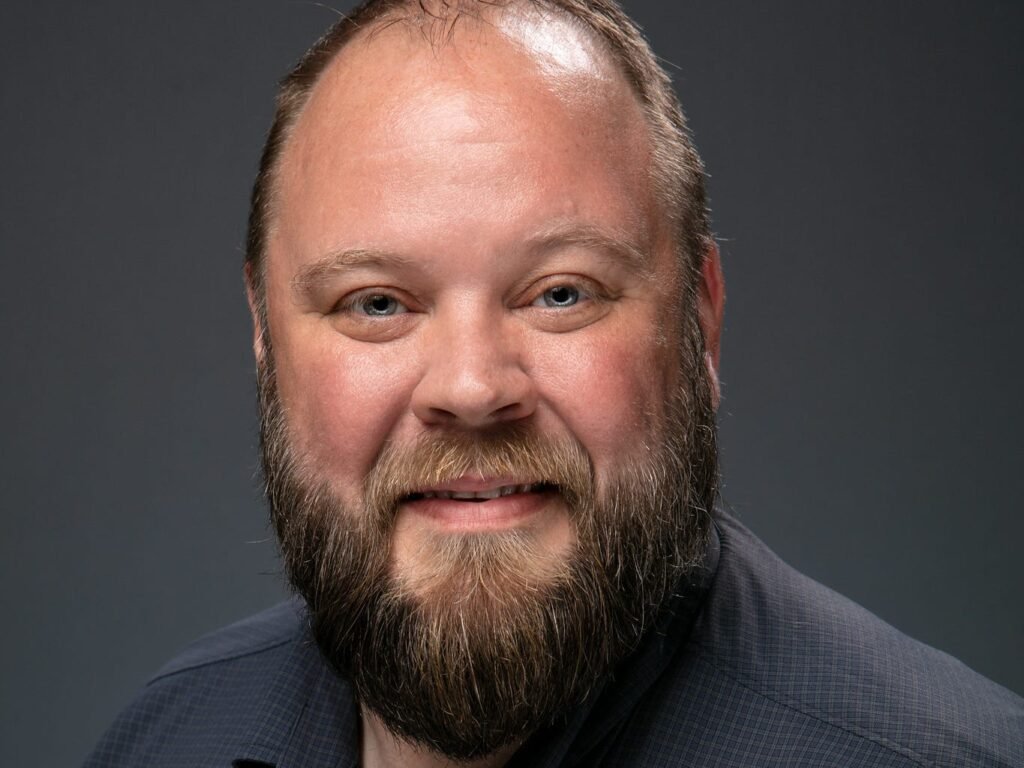 I'm 49 years old and was laid off from my six-figure sales job. I now make $52,000 in an entry-level role where I work alongside college grads.