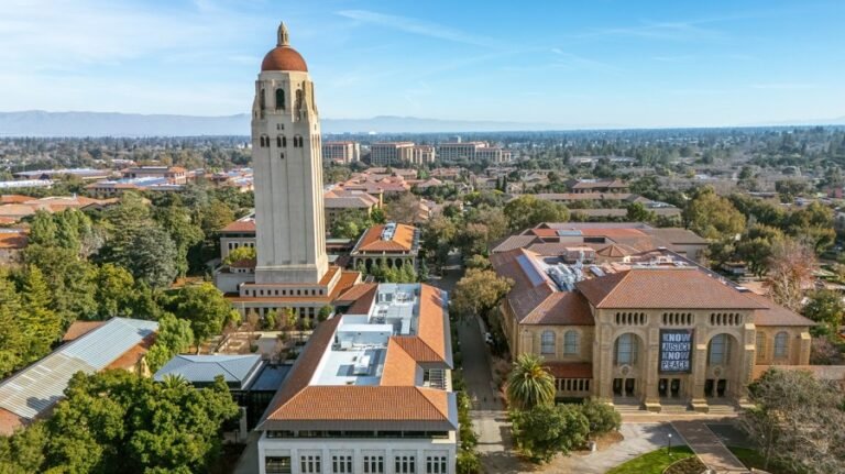 Stanford lays off hundreds, blaming Trump policies