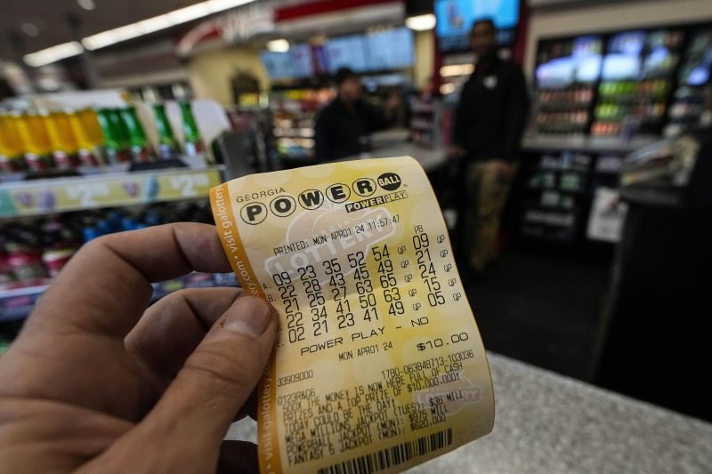 If you won the $1.7B Powerball jackpot, how much would be withheld for taxes?