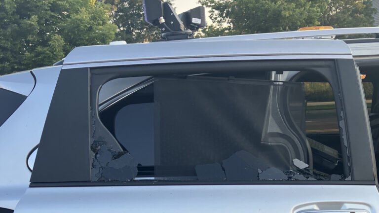 Man Attacks Police Photo Enforcement Van, Gets Caught On Camera