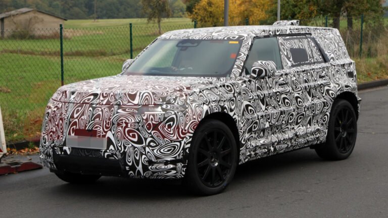 Land Rover's Baby Defender Looks Way Better Than A BMW iX, Even In Camouflage