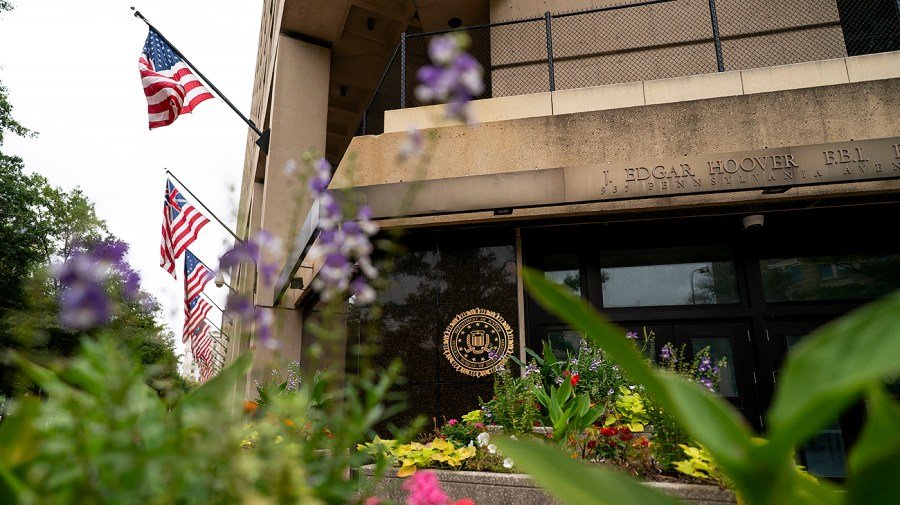 Former FBI employee sues bureau, alleging firing over pride flag