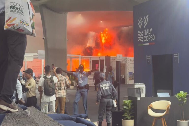 Fire forces evacuation from climate summit as talks reach critical stage
