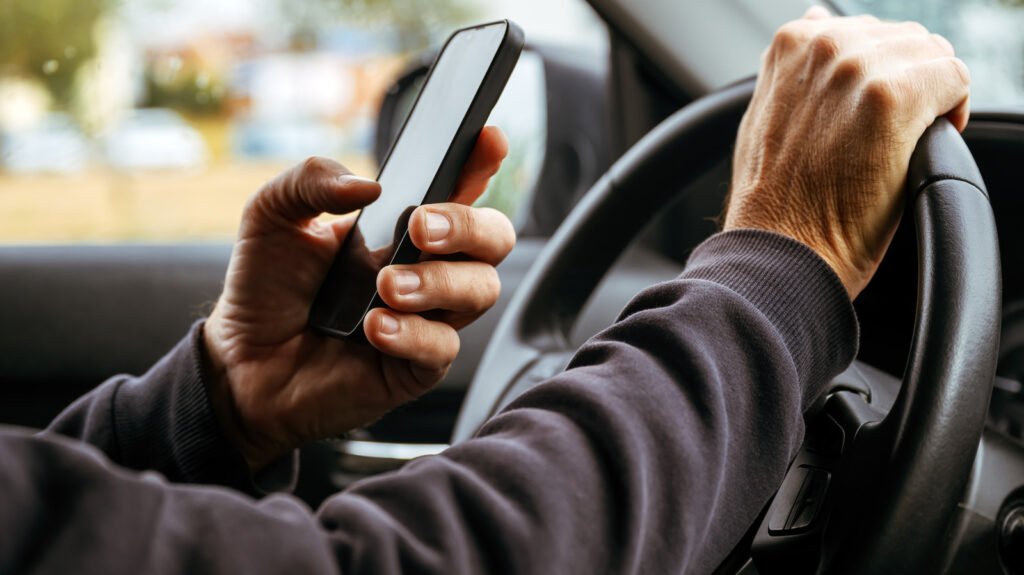Is It Legal To Use Your Phone At A Red Light? What US State Laws Say