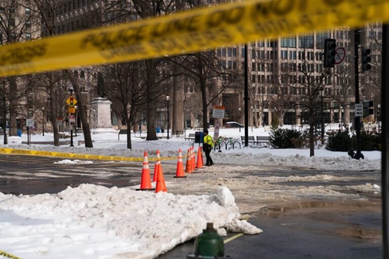 DC crews pile snow at RFK Stadium site as city slowly digs out of storm