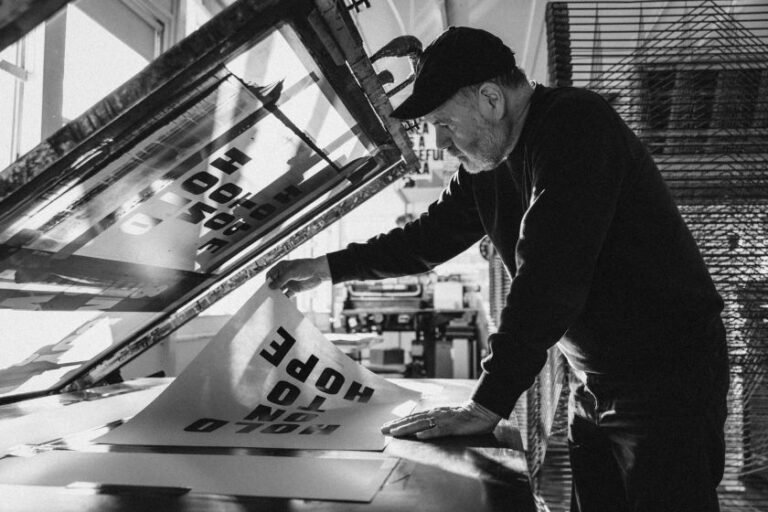How Anthony Burrill turned four giant letters into Glastonbury's most hopeful landmark
