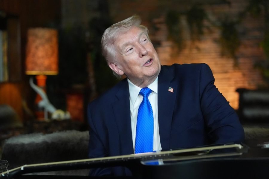 Trump tours Elvis Presley's Graceland, signs guitar during Memphis visit