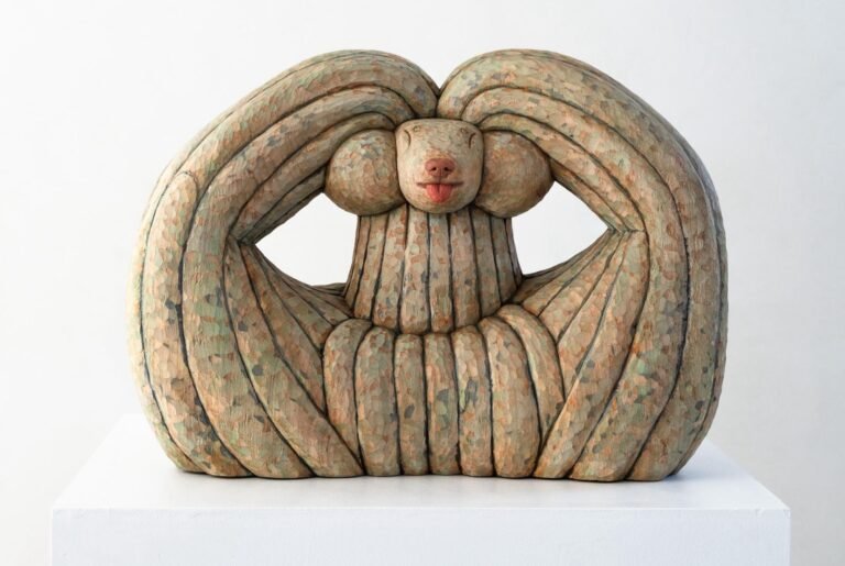 Misato Sano’s Charming Wooden Dogs Are Carved With Personality